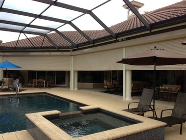 Custom Roll Down Shutters attached to round columns in Southwest, FL