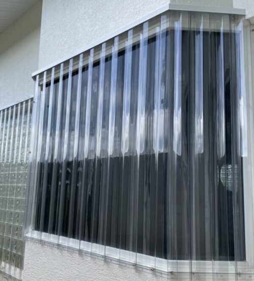 Custom Storm Panel shutters installation near Marco Island