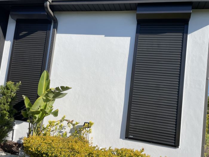 Roll Down Shutters Protecting Windows