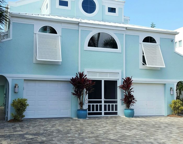 Bahama shutters for shade and storm protection