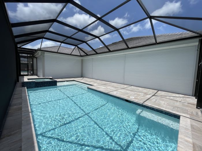 Storm shutters installation on a Southwest Florida home