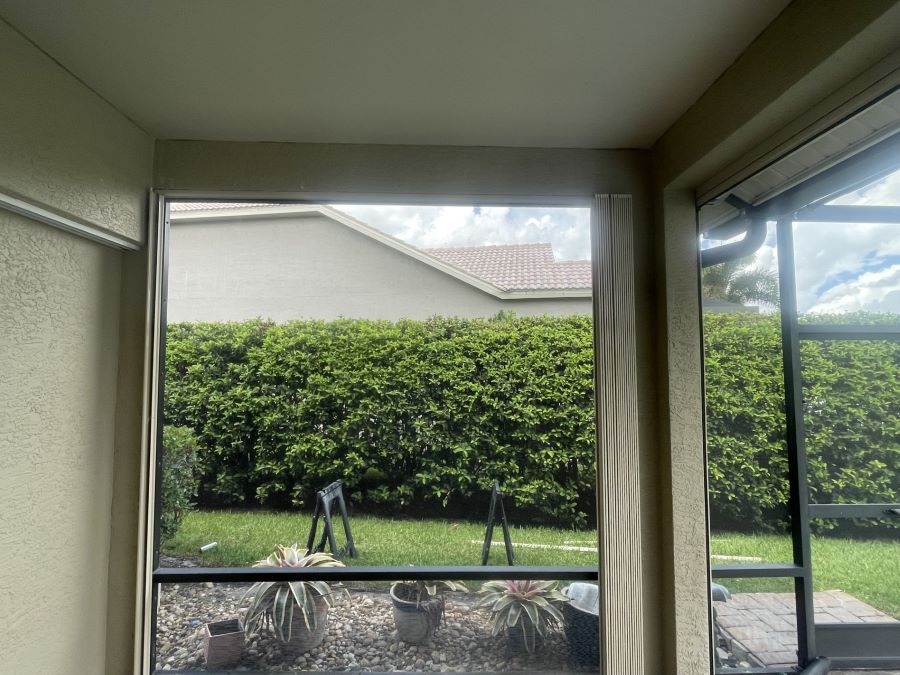 Accordion Shutter protecting porch in Naples, FL and Surrounding Areas